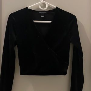 Black crossover v neck low cut velvet top
